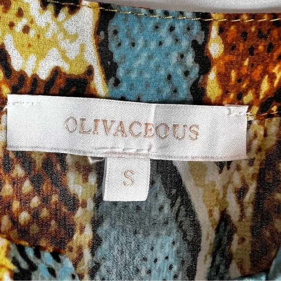 Oliváceos RADIANT REVEAL SNAKE
PRINT ROMPER Bohemian Print Jumpsuit Size: S - Picture 12 of 17